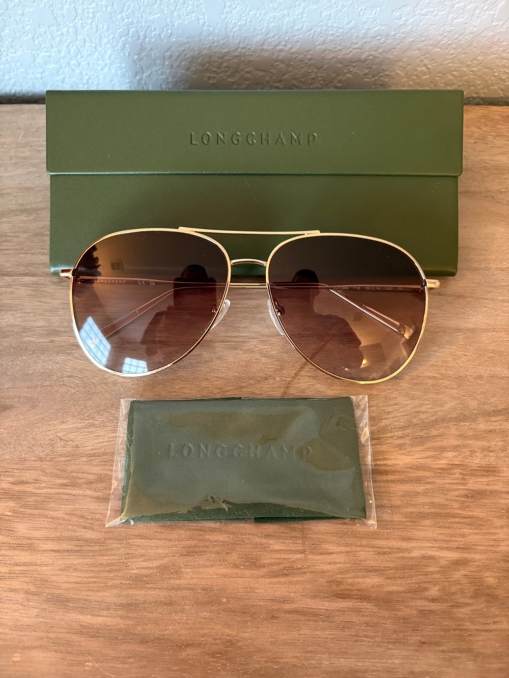 Longchamp Gold Aviator Sunglasses with Brown Gradient Lenses